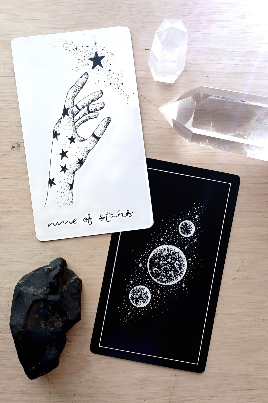 the nine of stars/pentacles tarot card from The Wandering Moon Tarot by Rachael Jean of MoonHaus Studio