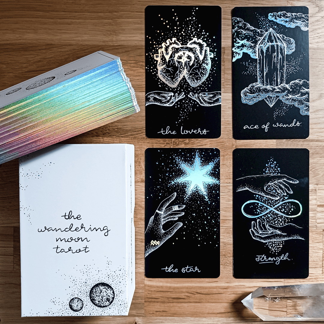 tarot spread showing The Lovers & The Star tarot cards, with box and deck guidebook