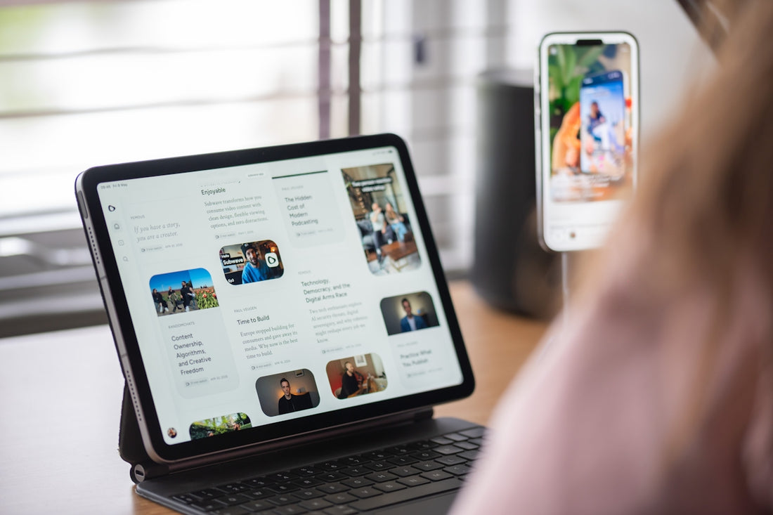 Digital content displayed on a tablet and a nearby smartphone.