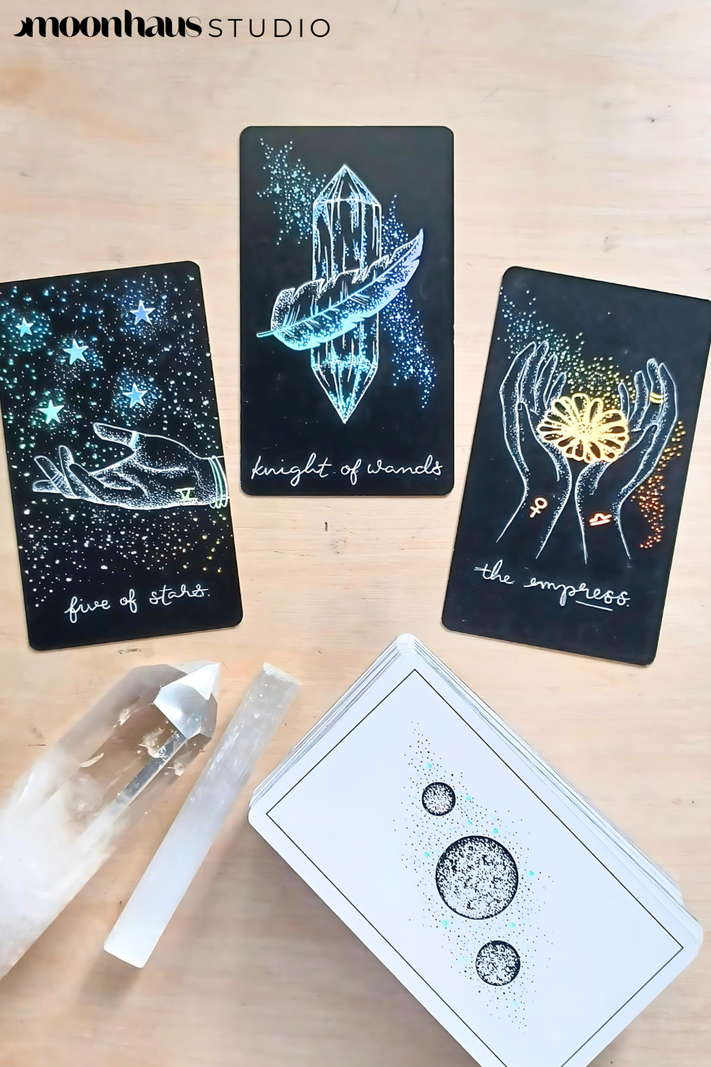 tarot cards, aesthetic: black tarot card art with holographic details & guidebook